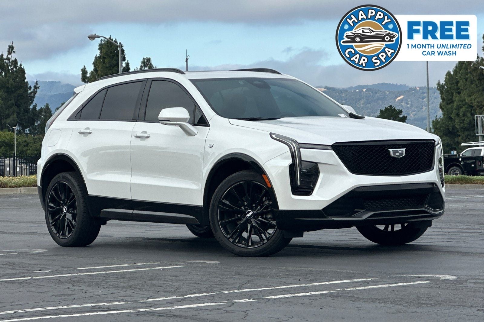 2025 Cadillac XT4 Sport in Crystal White Tricoat — front three-quarter view