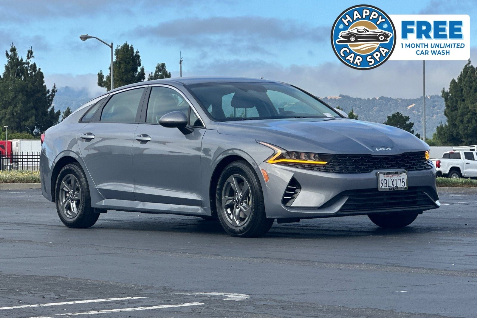 2022 Kia K5 LX in Everlasting Silver — front three-quarter view
