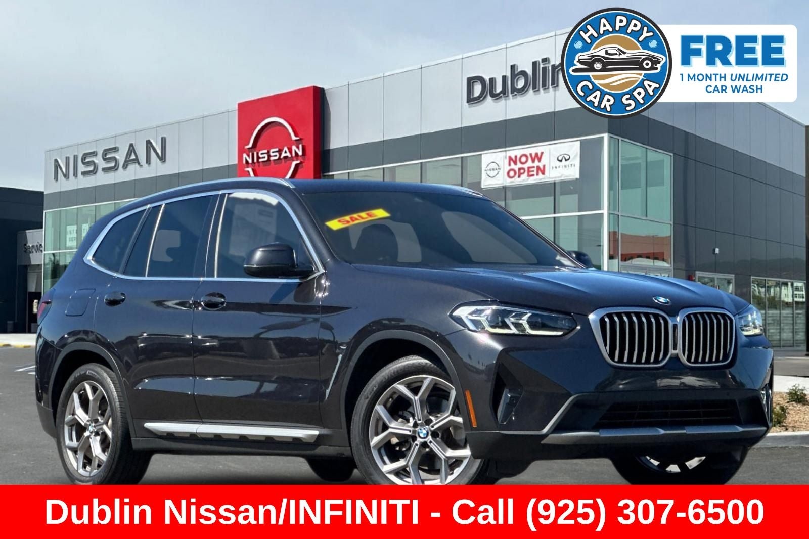 2022 BMW X3 xDrive30i in Dark Graphite Metallic — front three-quarter view